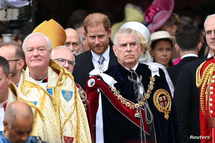 Prince Harry and Prince Andrew look on on the day of King Charles' and Queen Camilla's coronation, in London, Britain, May 6,…