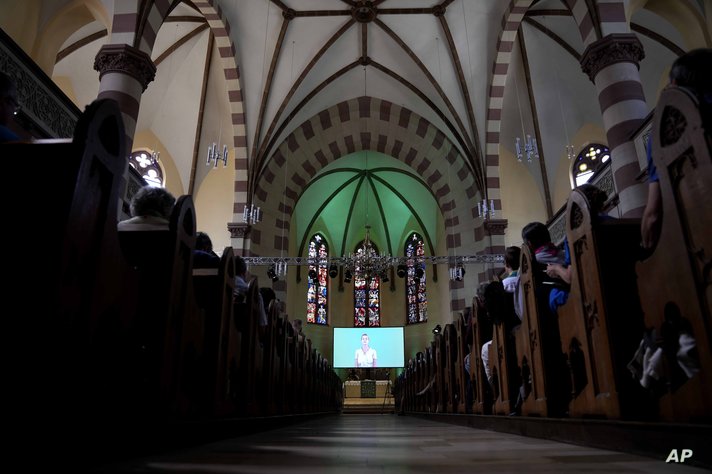 People attend a church service in Nuremberg, Germany, Friday, June 9, 2023.  Hundreds of German Protestants have attended a…