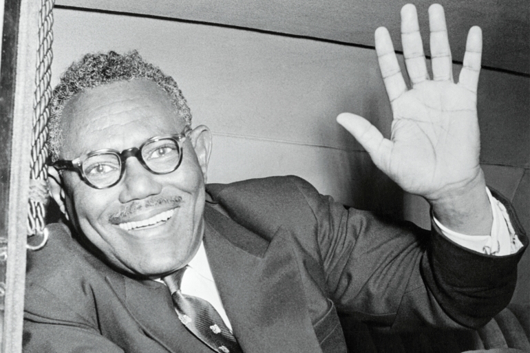 Sir Anthony Eden Talking with Ismail El Azhari (Original Caption) Prime Minister of Sudan Sayed Ismail el Azhari, waves from his car as he leaves London airport. Tomorrow he will receive an audience with Queen Elizabeth at Buckingham Palace. GettyImages-514982958