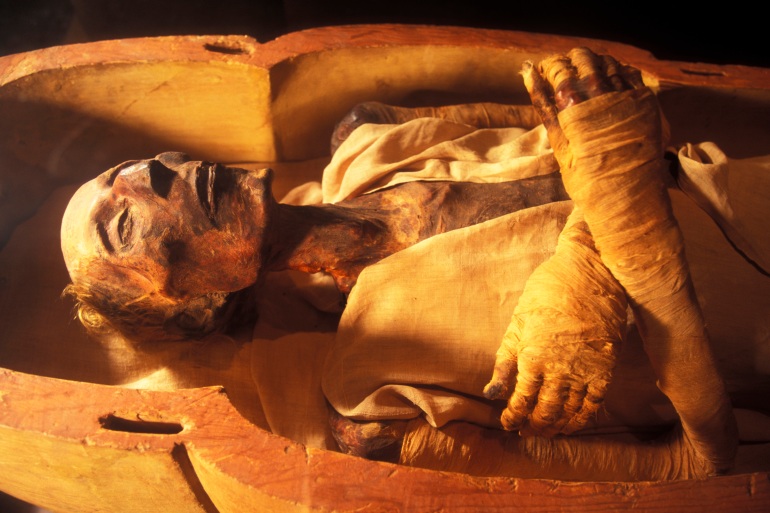 CAIRO, EGYPT - APRIL 2006: The mummy of Ramses II (1301-1235 BC), son of Sethy I, in April 2006, at Cairo Museum, Egypt. The mummy was discovered with the other royal mummies in the Deir el Bahari hiding place by Maspero, Ahmed Bey Kamal and Brugsch Bey. (Photo by Patrick Landmann/Getty Images)