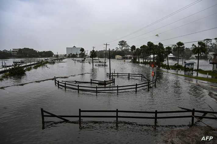 A flooded street is seen near the Steinhatchee marina in Steinhatchee, Florida on August 30, 2023, after Hurricane Idalia made…