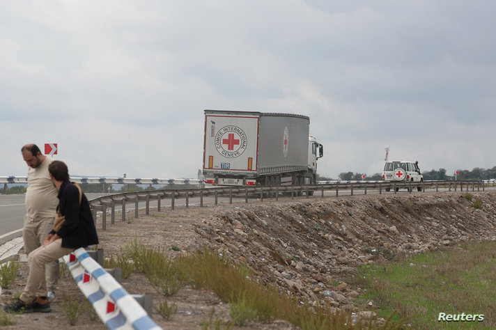 Vehicles of the International Committee of the Red Cross (ICRC) transporting humanitarian aid for residents of Nagorno-Karabakh…