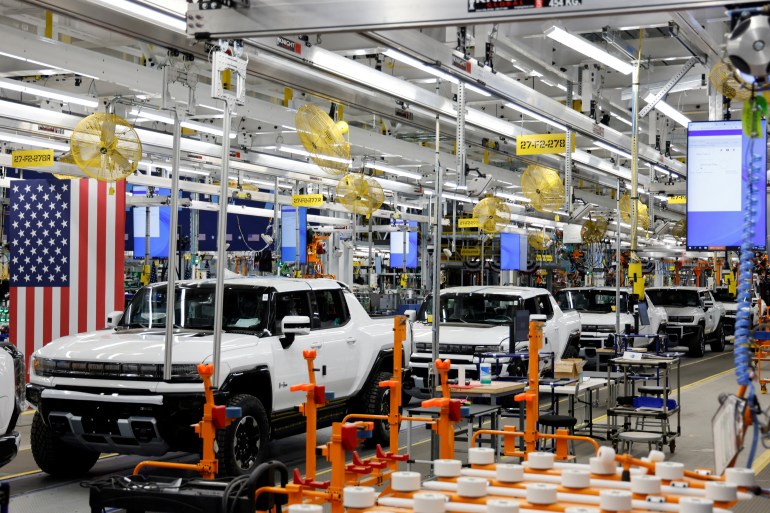 FILE PHOTO: Hummer EVs are seen on the production line as U.S. President Joe Biden tours the General Motors 'Factory ZERO' electric vehicle assembly plant, in Detroit, Michigan, U.S. November 17, 2021. REUTERS/Jonathan Ernst/File Photo