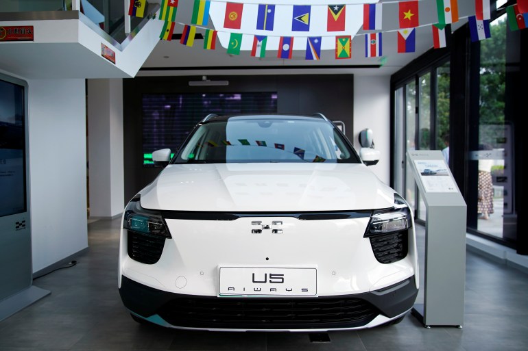 An Aiways U5 electric car is displayed at a company store in Shanghai, China September 22, 2020. Picture taken September 22, 2020. REUTERS/Aly Song