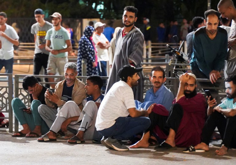 People gather on a street in Casablanca, following a powerful earthquake in Morocco, September 9, 2023. REUTERS/Abdelhak Balhaki