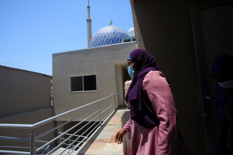 Muslim migrants attend the inauguration of a shelter built by the Latina Muslim Foundation for Muslim migrants of any nationality waiting to enter the United States, in Tijuana, Mexico June 11, 2022. REUTERS/Jorge Duenes