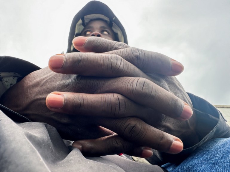 A migrant from Mali, who said he is from the Fulani community and escaped the war in his country and arrived in El Hierro Island a year ago, speaks to Reuters journalist in Barcelona, Spain September 20, 2024. REUTERS/Horaci Garcia