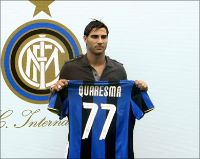 afp : Portugal winger Ricardo Quaresma poses with his new jersey after signing for Inter Milan in Appiano Gentile, north-west of Milan, on September 2, 2008. The 25-year-old was