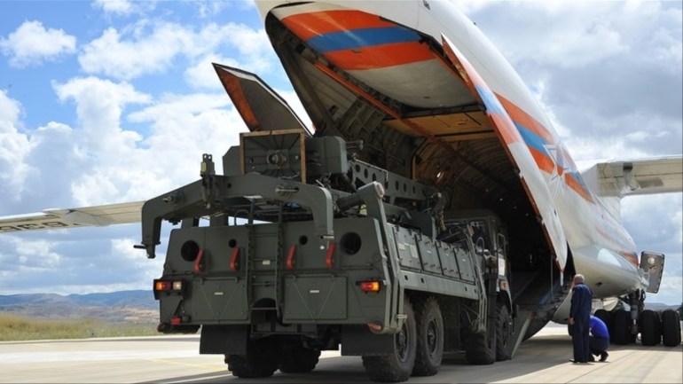 epa07712330 A handout photo made available by Turkish Defence Ministry press office shows Russian military cargo planes carrying some part of the Russian S-400 anti-aircraft missile system purchased from Russia after arriving to Turkey at the Akincilar airbase in Ankara, Turkey, 12 July 2019. NATO intended to stop Turkey from purchasing S-400 missiles from Russia, and recommended to rather buy US-made systems. Washington threatened to sanction Turkey and expel it from i