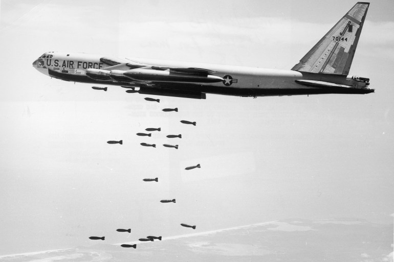 October 1965: A US Air Force strategic air command (SAC) B-52 stratofortress drops a string of 750-pound bombs over a coastal target in the Republic of Vietnam during the Vietnam War. Official U.S. Air Force photo released by the Department of Defense. (Photo by US Air Force/Getty Images)