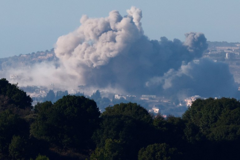 Smoke billows over Rmyach, southern Lebanon, amid ongoing hostilities between Hezbollah and Israeli forces, as seen from Sasa, northern Israel, October 18, 2024. REUTERS/Gonzalo Fuentes TPX IMAGES OF THE DAY