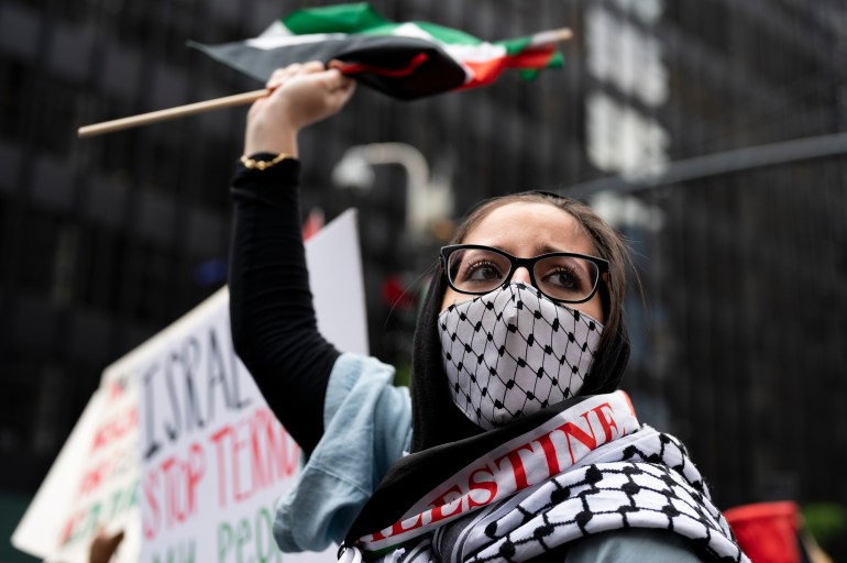 MANHATTAN, NEW YORK, USA - 11 May, 2021: Protesters supporting Palestinian rights rally in front of the Israeli Consulate in New York City.