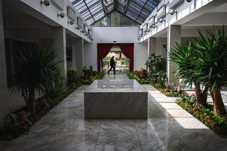 (FILES) A security staff walks past the tomb of Josip Broz Tito (18921980), former President of communist Yugoslavia, at his resting place inside of the "House of flowers", located in the Museum of Yugoslav History in Dedinje neighborhood, in Belgrade on April 30, 2020. - Belgrade's tourist hotspot, the Museum of Yugoslavia, is at risk of losing its most visited site  the resting place of socialist Yugoslavia's President, Josip Broz Tito, due to decades-long ideological disputes. The citys nationalist mayor, Aleksandar Sapic, publicly called for moving Tito's grave to his native Croatia, despite it attracting over 120,000 visitors annually, arguing that the Belgrade needs to "move away from communism". (Photo by Andrej ISAKOVIC / AFP)