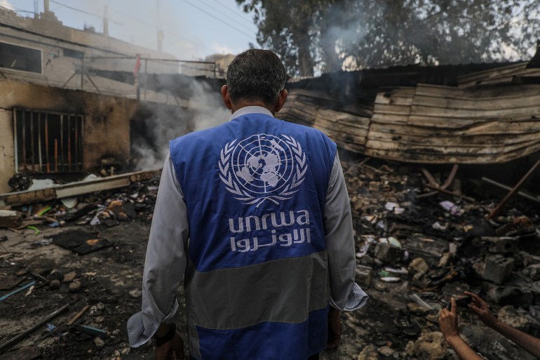 epa11339653 An UNRWA employee inspects a destroyed United Nations school following an air strike in Al Nuseirat refugee camp, central Gaza Strip, 14 May 2024. At least six people were killed in the strike which hit the UNRWA (United Nationas Relief and Works Agency for Palestinians in the near east) school, according to the Palestinian Civil Defense in Gaza. More than 35,000 Palestinians and over 1,455 Israelis have been killed, according to the Palestinian Health Ministry and the Israel Defense Forces (IDF), since Hamas militants launched an attack against Israel from the Gaza Strip on 07 October 2023, and the Israeli operations in Gaza and the West Bank which followed it. EPA-EFE/MOHAMMED SABER