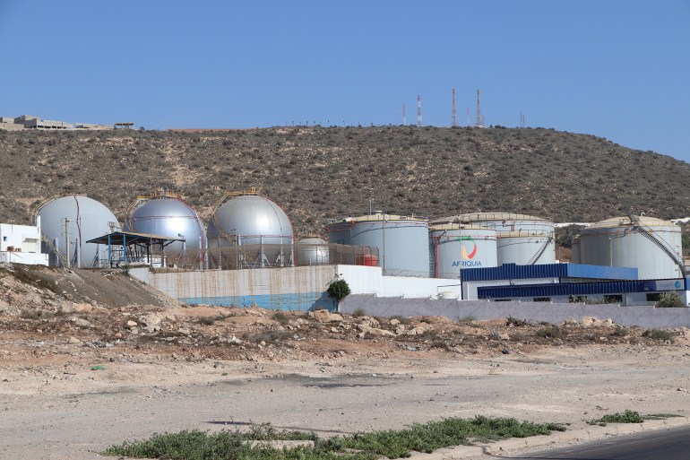 Agadir, Morocco - September 19, 2022: Large gray painted gas tanks in Agadir region, Morocco. Gas storage in Morocco.; Shutterstock ID 2204704819; purchase_order: aj; job: ; client: ; other: