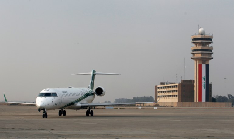 An Iraqi Airways plane lands at Baghdad International airport