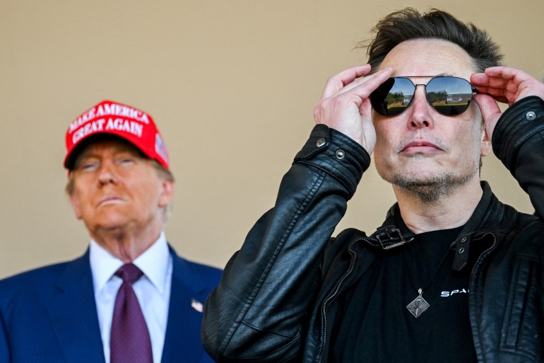 FILE PHOTO: U.S. President-elect Donald Trump and Elon Musk watch the launch of the sixth test flight of the SpaceX Starship rocket in Brownsville, Texas, U.S., November 19, 2024. Brandon Bell/Pool via REUTERS/File Photo