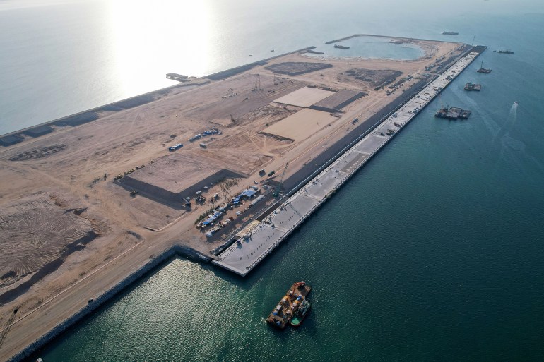 BASRA, IRAQ - APRIL 23: An aerial view of Al Faw Grand Port as the Development Road Project, a Memorandum of Understanding for Joint Cooperation signed between Turkiye, Iraq, Qatar and the UAE, starting at the Port, is under constructionin Basra, Iraq on April 23, 2024. Faw Grand Port will be one of the largest ports in the Middle East with the world's longest breakwater of 14,523 meters. The project also connects Iraq to Asia, and Europe via Turkiye with land and rail lines, aiming to reduce transportation time and turn Iraq into a transit center. (Photo by Haidar Mohammed Ali/Anadolu via Getty Images)