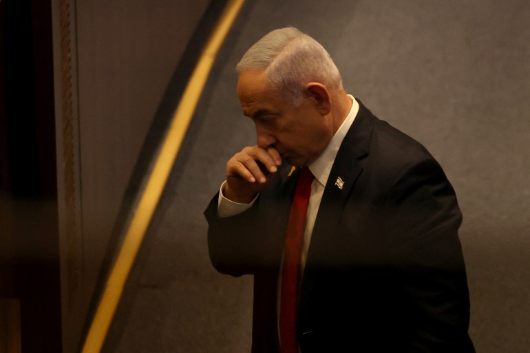 Israeli Prime Minister Benjamin Netanyahu attends a discussion on the subject of hostages kidnapped during the deadly October 7, 2023 attack, in Israel's parliament, the Knesset, in Jerusalem, November 18, 2024. REUTERS/Ronen Zvulun