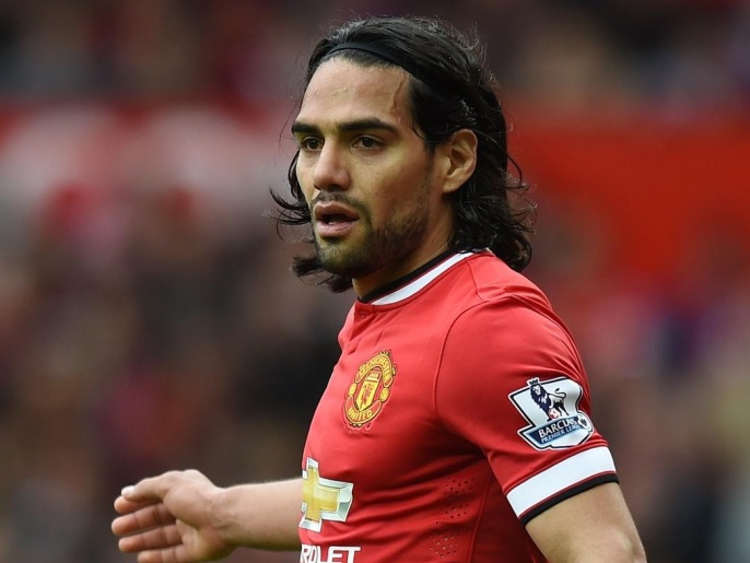Manchester United's Colombian striker Radamel Falcao looks on during the English Premier League football match between Manchester United and Arsenal at Old Trafford in Manchester, northwest England, on May 17, 2015. AFP PHOTO / PAUL ELLISRESTRICTED TO EDITORIAL USE. No use with unauthorized audio, video, data, fixture lists, club/league logos or live services. Online in-match use limited to 45 images, no video emulation. No use in betting, games or single club/league/player publications