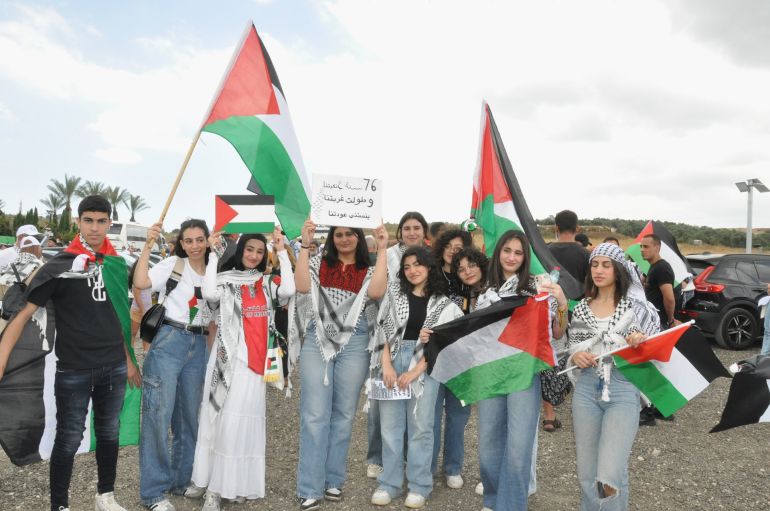 صورة 7 حضور باز للنشء الفلسطيني بمسيرة العودة التقليدية التي تنظمها لجنة الدفاع عن حقوق المهرجين سنويا عشية ذكرى النكبة.