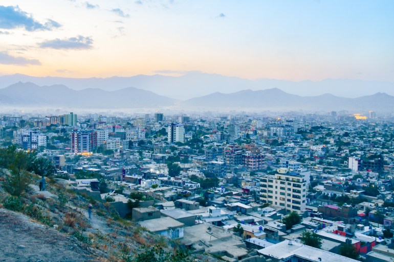 Kabul, Afghanistan - 20 th october, 2023: Aerial view panorama capital cityscape in sunny day. Residential Buildings architecture and high rise apartment buildings