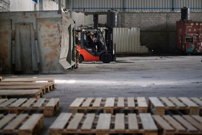 A World Food Program warehouse is seen empty in the Nuseirat refugee camp, Gaza Strip, Saturday April 26, 2025. (AP Photo/Abdel Kareem Hana)