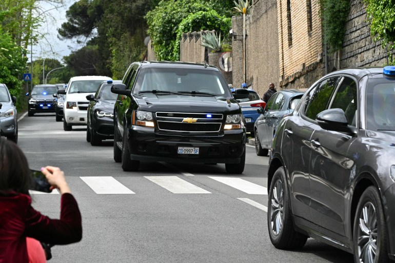 Vehicles of the US delegation are escorted by Italian police at the entrance of the Omani embassy in Rome where a second round of nuclear talks between Iran and the United States will be held on April 19, 2025. An Iranian delegation headed by Foreign Minister Abbas Araghchi arrived in Rome ahead of nuclear talks with the United States. (Photo by Andreas SOLARO / AFP)