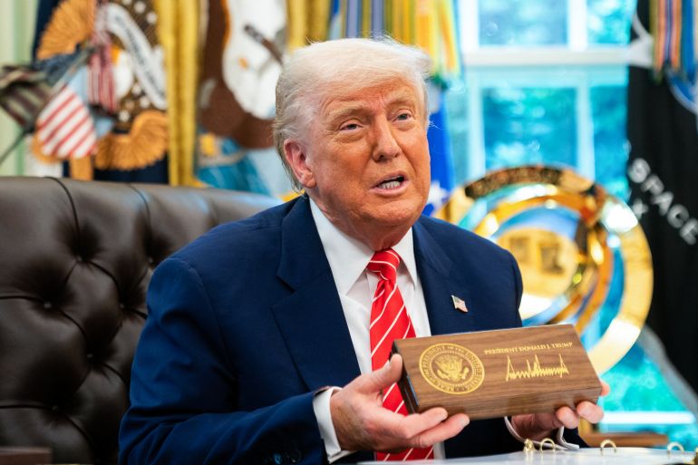 US President Donald Trump speaks during a news conference before presenting Elon Musk with a "key to the White House" in the Oval Office of the White House in Washington, DC, on May 30, 2025.