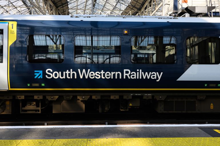 London, UK - September 21, 2024; South Western Railway name and logo on first class train carriage; Shutterstock ID 2540630635; purchase_order: aj; job: ; client: ; other: