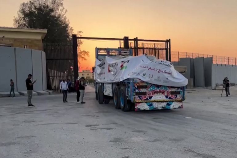 This frame grab taken from an AFPTV footage shows an aid truck on the Egyptian side of the Rafah crossing with the Gaza Strip, driving toward the besieged Palestinians territory on July 27, 2025.