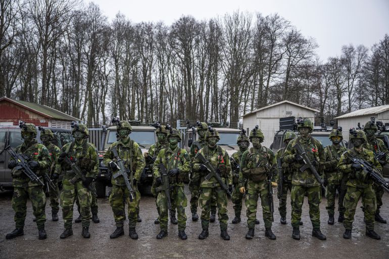Soldiers from the 13th counter intelligence battalion, 2nd reconnaissance platoon of the Swedish Armed Forces, participate in military exercise in Kungsangen, near Stockholm on February 27, 2024. (Photo by Jonathan NACKSTRAND / AFP)