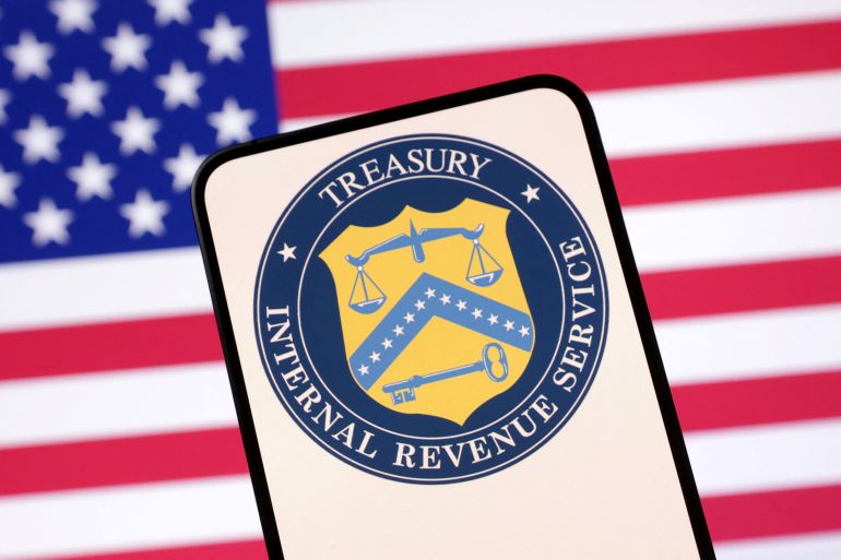 United States Department of the Treasury logo and U.S. flag are seen in this illustration taken April 23, 2025. REUTERS/Dado Ruvic/Illustration