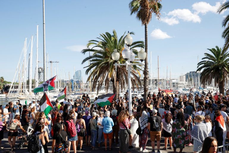 Activists gather at the launch of the Global Sumud humanitarian flotilla to Gaza, in the port of Barcelona, Spain, August 29, 2025. REUTERS/Eva Manez