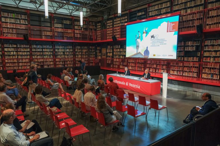VENICE, ITALY - JULY 22: Biennale cinema director Alberto Barbera (R) speaks to the audience in the Asac Ai Giardini library during the 82th Venice International Film Festival Presentation on July 22, 2025 in Venice, Italy. The 82nd Venice International Film Festival takes place on the Lido from August 27 to September 6, 2025, under the direction of Alberto Barbera and the presidency of the Biennale signed by Pietrangelo Buttafuoco. Opening the festival will be La grazia, the new film by Paolo Sorrentino (Photo by Stefano Mazzola/Getty Images)