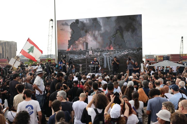 Lebanese demonstrators march during a gathering to honour the victims of the catastrophic port explosion in 2020 and to call for accountability for the blast, in Beirut on August 4, 2025.