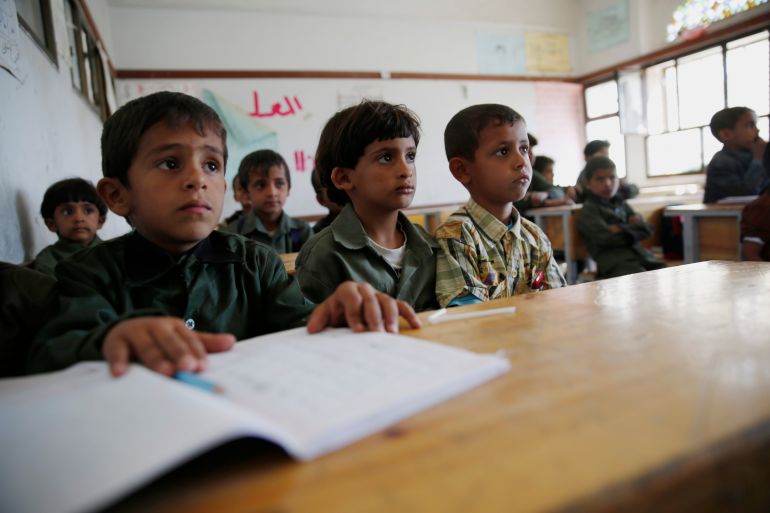 Yemeni students attend a class on the first day of a new school year at a public school in Sanaa, Yemen, Sunday, Nov. 1, 2015. (AP Photo/Hani Mohammed)