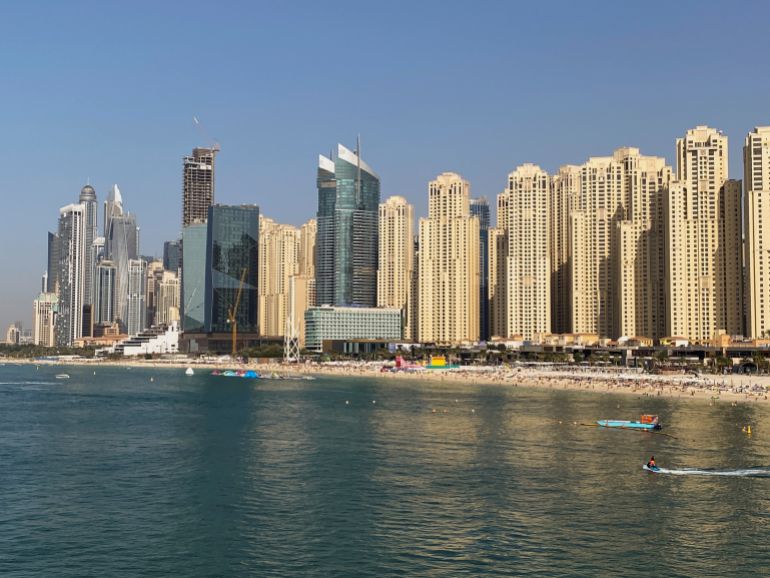 A general view of Residential Skyscrapers and a beach in Dubai, United Arab Emirates March 11, 2021. Picture taken March 11, 2021. REUTERS/Abdel Hadi Ramahi
