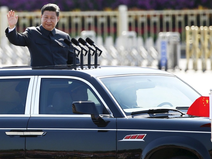 Chinese President Xi Jinping waves as he reviews the army, at the beginning of the military parade marking the 70th anniversary of the end of World War Two, in Beijing, China, in this September 3, 2015 file photo. An assertive China under President Xi Jinping now believes its military has the technology to at the very least make the United States think twice before undertaking any military adventures in what China sees as its backyard. REUTERS/Damir Sagolj/Files