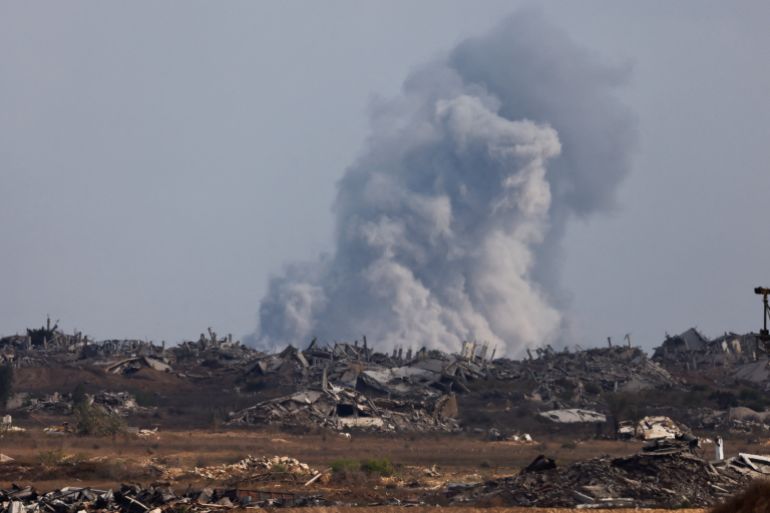 Smoke rises from Gaza after an explosion as seen from the Israeli side of the border, August 25, 2025. REUTERS/Amir Cohen