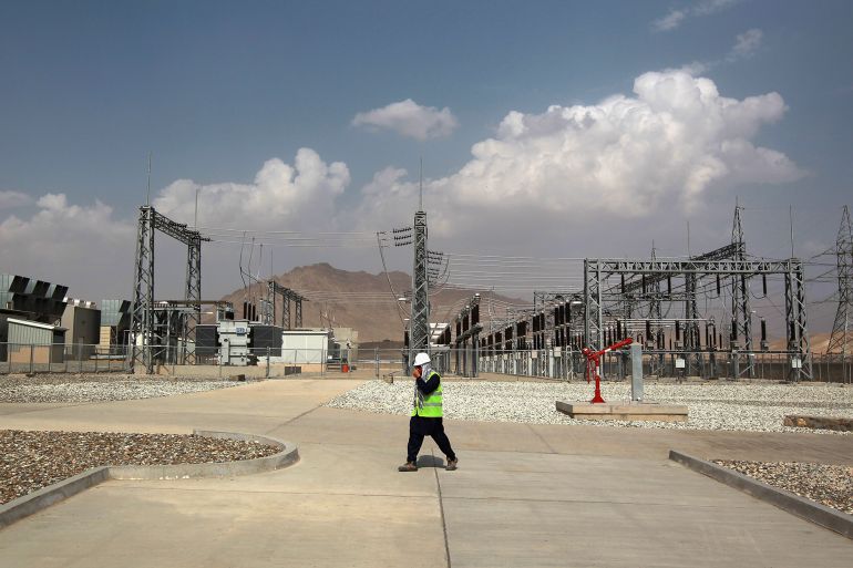 TARAKHIL, AFGHANISTAN - SEPTEMBER 08: A worker walks past electrical transformers at the U.S.-built 105MW Tarakhil Power Plant on September 8, 2011 in Tarakhil, Afghanistan, on the outskirts of Kabul. The $300 million USAID-funded plant has been criticized for the high price of the electricity it produces, mostly due to the exorbitant cost of transporting imported diesel fuel through Afghan war zones to operate the facility. Currently the plant runs at an average of 25 percent of capacity, only supplementing electricity for Kabul, which primarily uses cheaper imported power as well as hydroelectric power produced in Afghanistan. Proponents of the plant say that, although expensive, the Tarakhil plant helps provides energy independence for Afghanistan. Almost ten years after the 9/11 attacks and the U.S. invasion of Afghanistan, the U.S. government is spending some $2.5 billion in 2011 alone on development projects in Afghanistan. (Photo by John Moore/Getty Images)