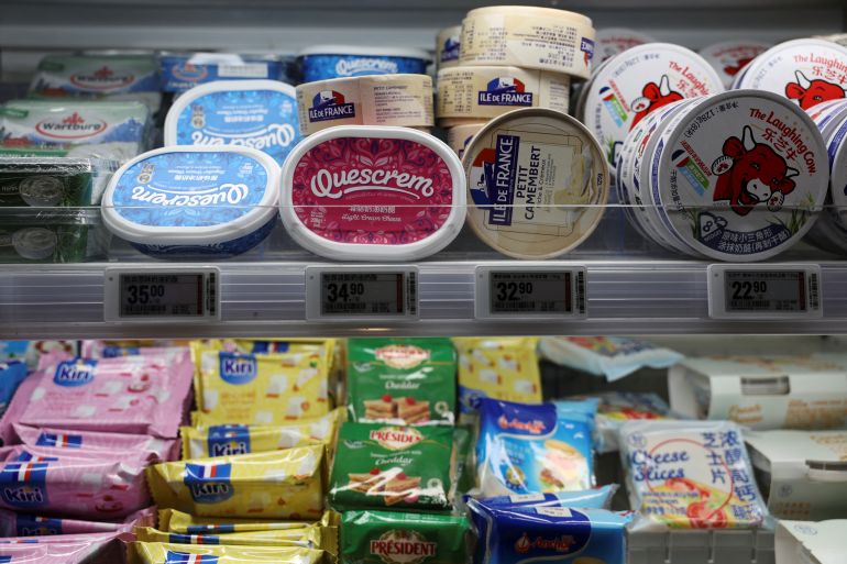 Cheese products displayed at the dairy section of a supermarket in Beijing, China June 13, 2024. REUTERS/Florence Lo