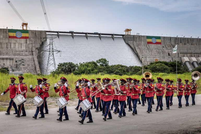 Members of the Ethiopian Republic March Band perform in front of the Grand Ethiopian Renaissance Dam (GERD) ahead of its official inauguration ceremony in Guba, on September 9, 2025.