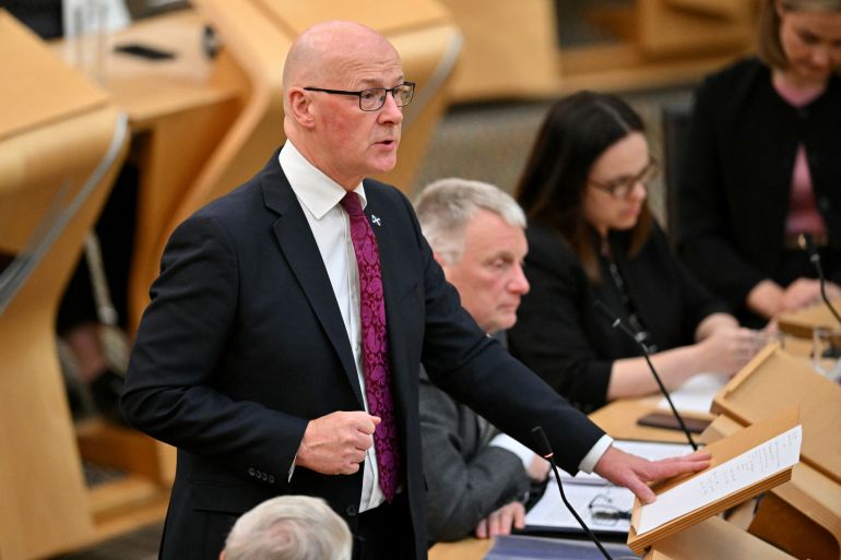 Scotland's First Minister John Swinney delivers a speech calling on the Scottish Parliament to recognise the State of Palestine, at the Scottish Government Buildings in Edinburgh, Scotland on September 3, 2025. (Photo by ANDY BUCHANAN / AFP)