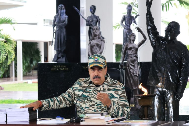 This handout picture released by the Venezuelan Presidency press office shows Venezuela's President Nicolas Maduro gesturing as he talks during a meeting with the high military command in Caracas on September 5, 2025.
