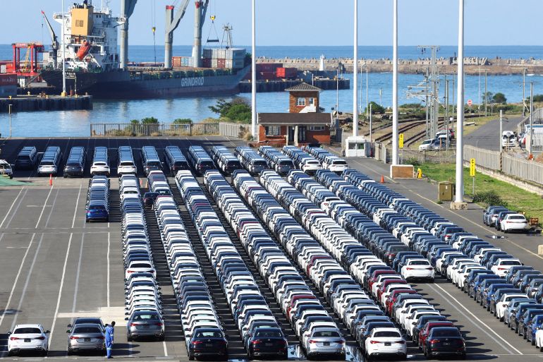 FILE PHOTO: A worker inspects cars at a port, in East London, in the Eastern Cape province, South Africa, July 7, 2022. REUTERS/Siphiwe Sibeko/File Photo