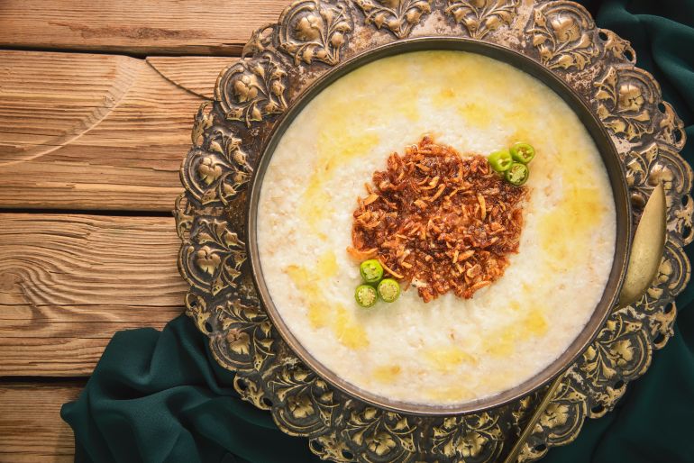 Arabic Cuisine; 'Jareesh' is a national dish in Saudi Arabia. It's a delicious grain-based stew made from crushed wheat. Garnished with fried onions and some melted butter.